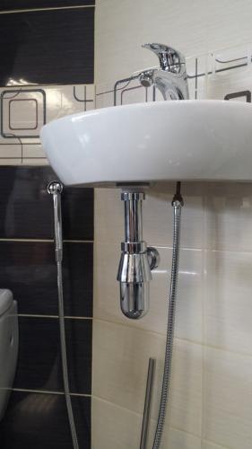 Bateria umywalkowa z rączką bidetową 1209-05 Sapho