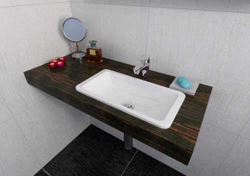 Umywalka kompozytowa wpuszczana w blat 50 x 26 cm biały KAMA 50134 Sapho aranżacja