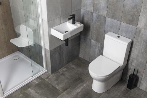 Umywalka ceramiczna mała MINOS 45 x 26 cm prawa 4057 Sapho wizualizacja