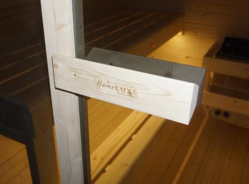 Sauna zewnętrzna ogrodowa 4 osobowa sucha Fińska w kształcie beczki świerk z siedziskami zewnętrznymi BERGEN F70220 Sanotechnik pochwyt